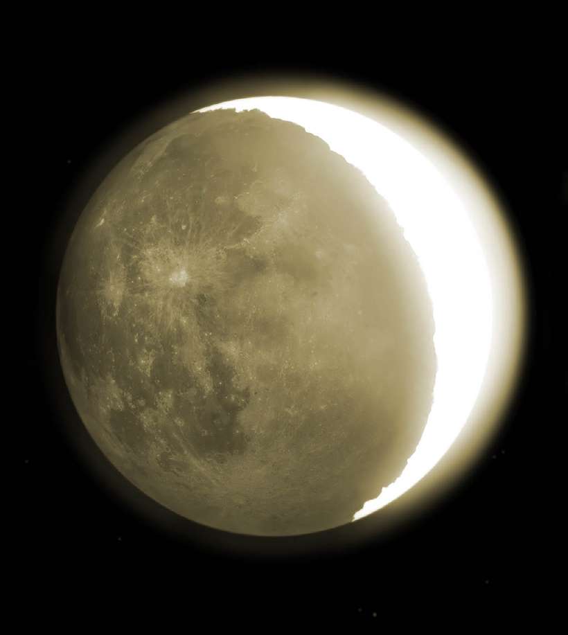 The eerie glow around a crescent moon is called earthshine.