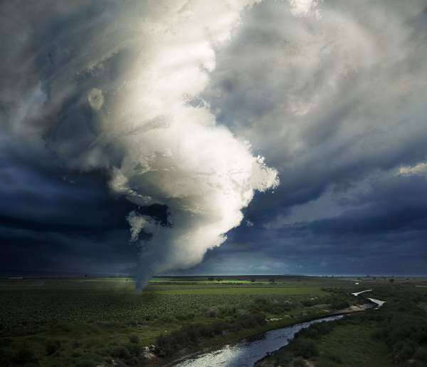 A tornado is a violently rotating column of air that is in contact with both the earth and the clouds.