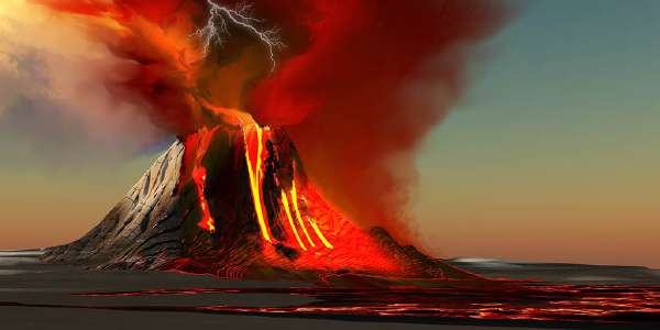 The Kilauea volcano erupts on the island of Hawaii with plumes of fire and smoke. Rivers of lava head to the ocean making new land.