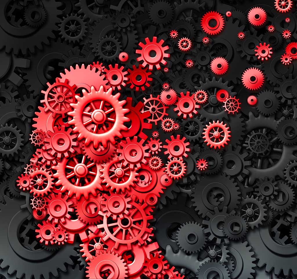 Cogs in the shape of a thinking mind illustrating brain injury and neurological memory loss .